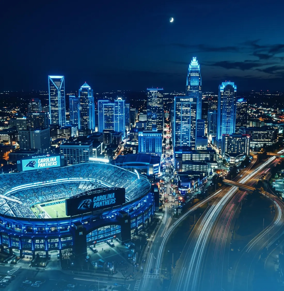 Bank of America Stadium and the Charlotte skyline at night