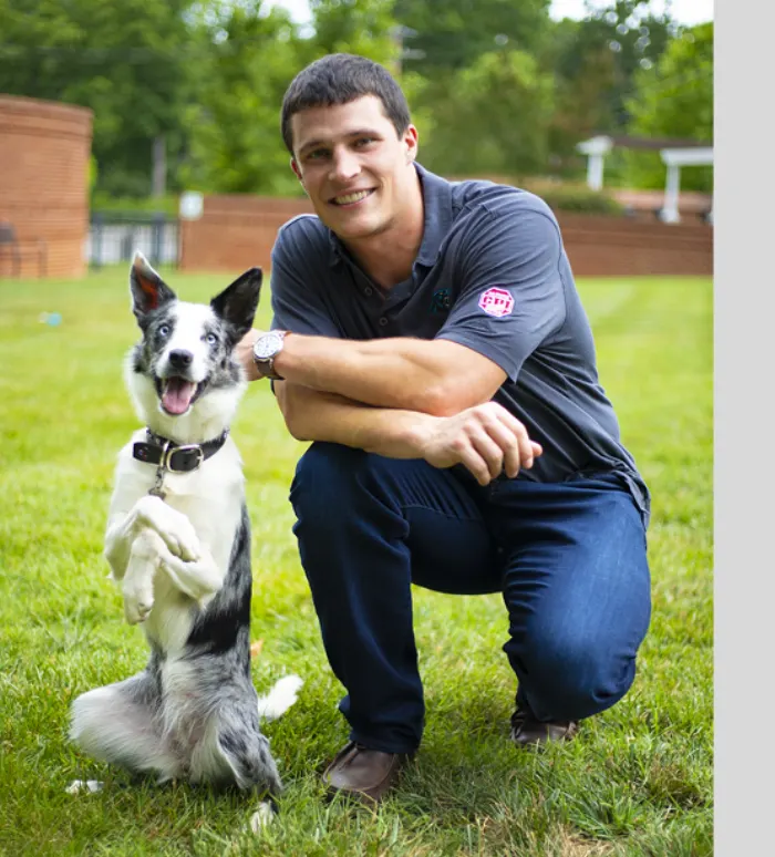 Luke Kuechly with a dog